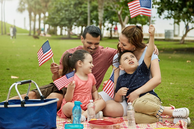 Patriotic_Family_Picnicking_at_Miami_Public_Park_for_a_family_celebration_of_labor_day